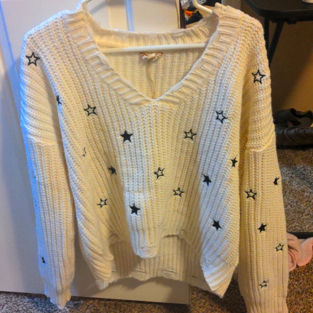 Hem and thread star sweater